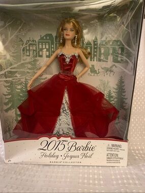 Barbie Holiday Collection doll from 2015 in red and silver gown. New in box.